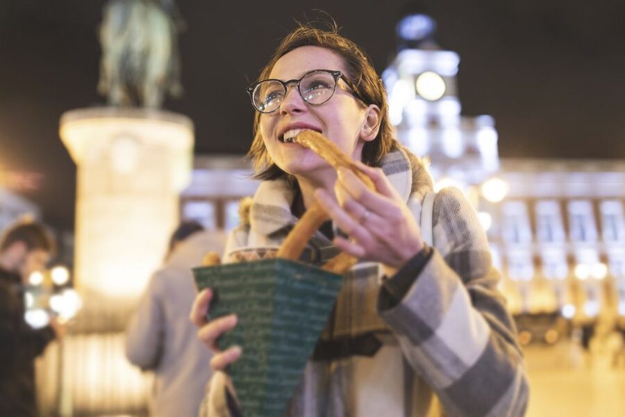 Madrid: Full-Day Private City Tour with Flamenco Show & Meal - Puerta del Sol and a breakfast of churros