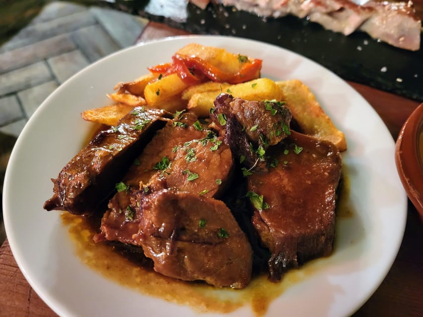 MALAGA: ULTIMATE FLAMENCO & TAPAS TOUR - Small plates and vermouth at a traditional ultramarinos