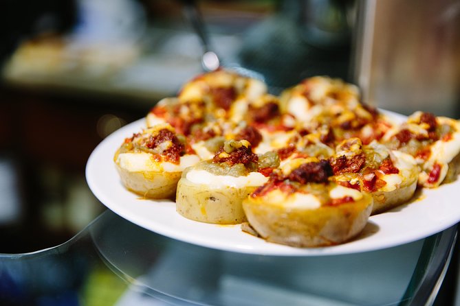 Private Barcelona Night Tapas Tour with Flamenco Show - Eight tastings, cava, and local wine