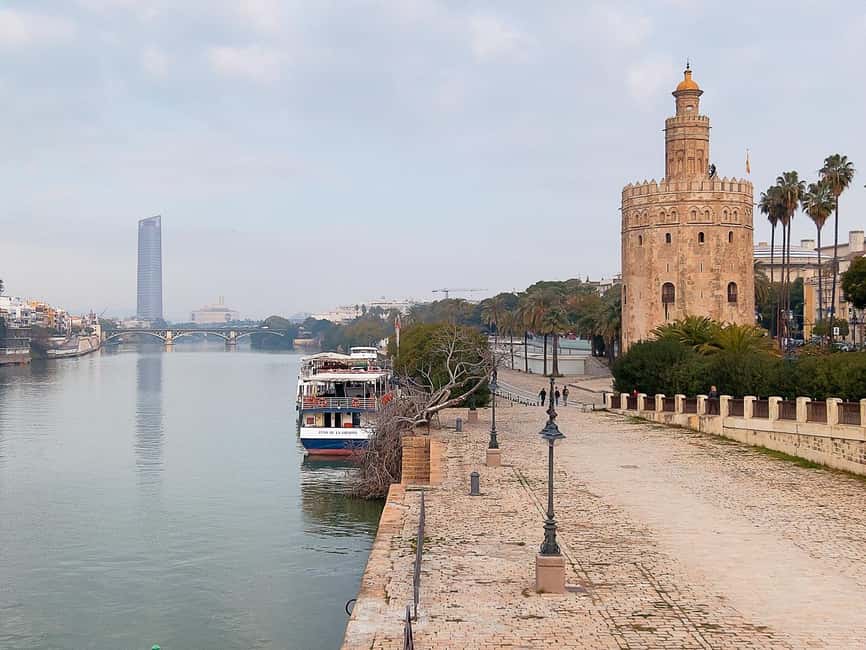 Unforgettable Seville: Tour of Seville and the Jewish Quarter + Flamenco Show - El Arenal, the Torre del Oro, and river views